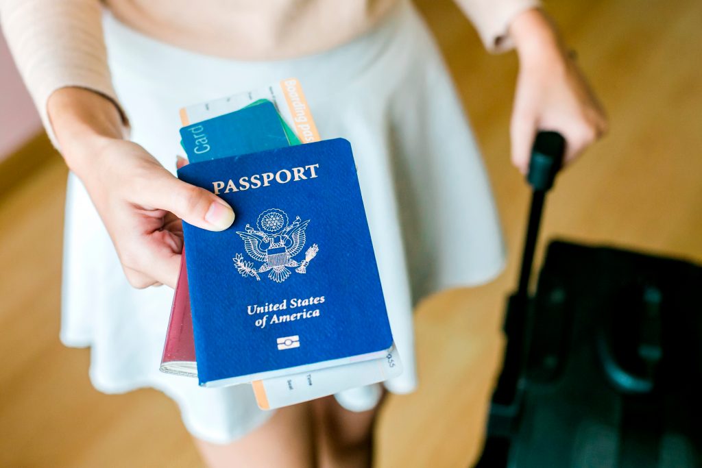 Luggage beside documents for vietnam visa at airport for austrian citizens